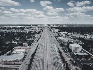An aerial view of multiple Stransport vehicles moving along a highway, showcasing our reach across India.