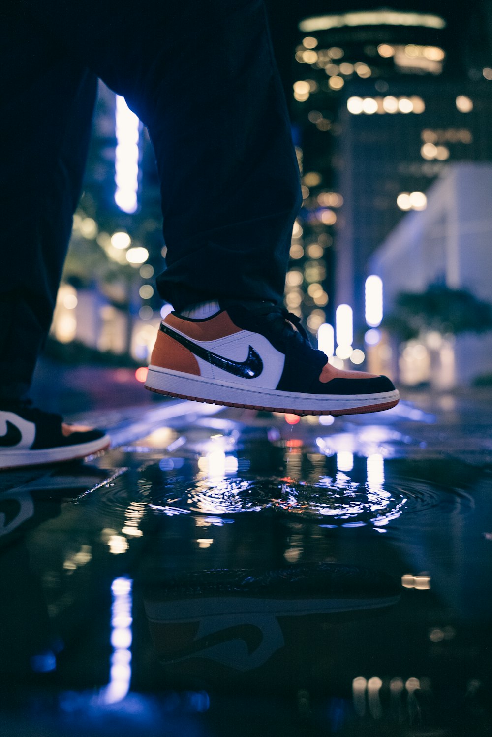 a person standing on top of a skateboard