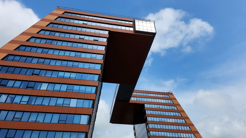 a very tall building with a sky background