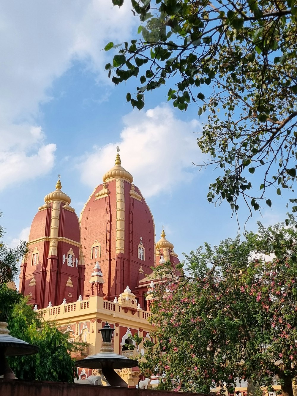 a large red building with two towers on top of it