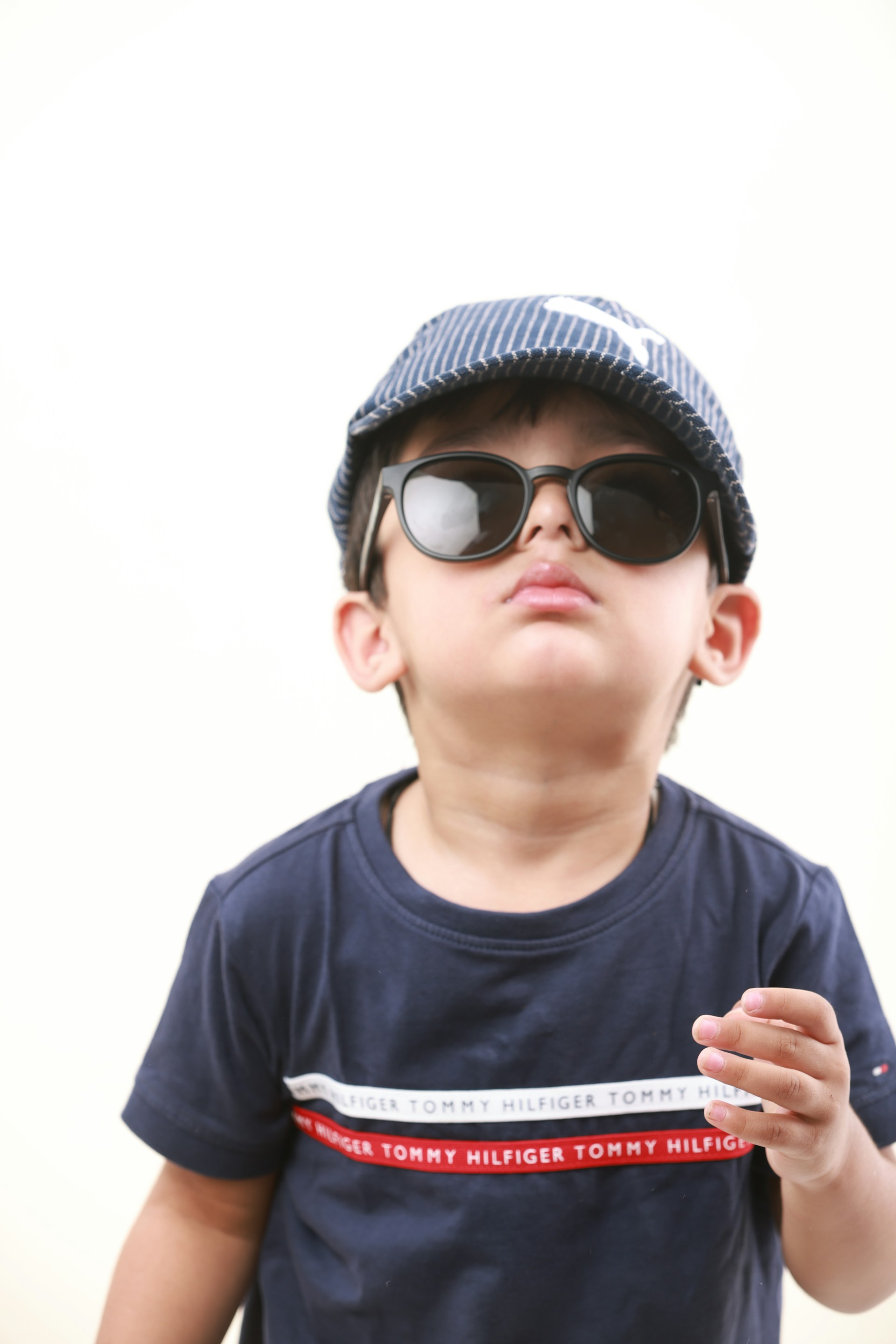 woman wearing yellow long-sleeved dress under white clouds and blue sky during daytime