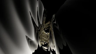 A moody acrylic piece blending black and muted grays with hints of metallic sheen.