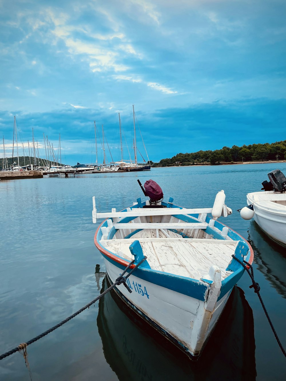 a couple of boats that are sitting in the water