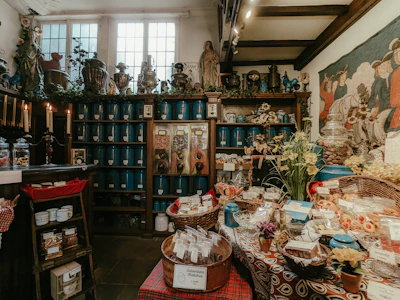 A wide shot of the shop interior showing shelves filled with artisanal goods.