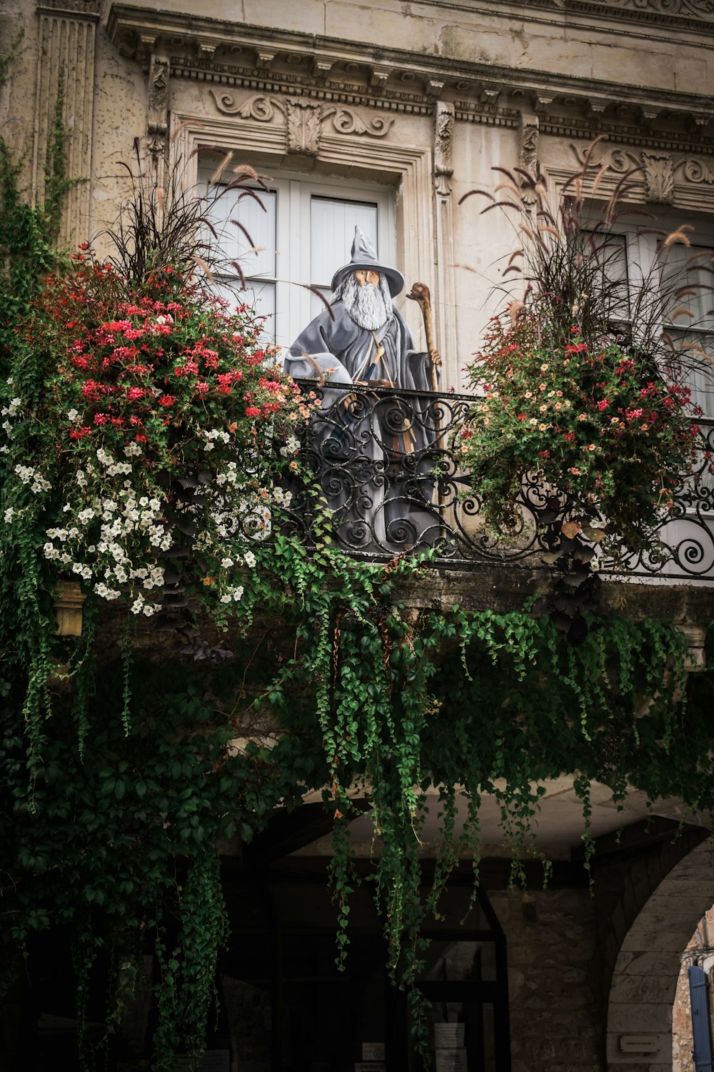 a balcony with a painting of a man on it