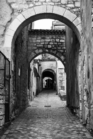 Close-up of weathered stone pathways winding through the historic town.