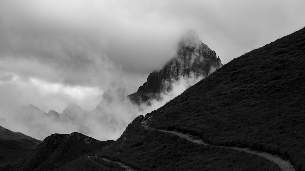 a black and white photo of a mountain