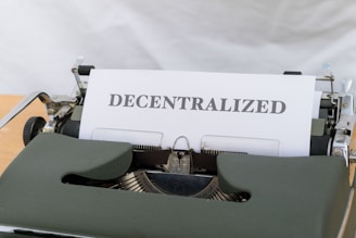 a typewriter with a paper that reads decentralized