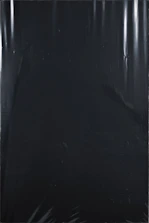 Close-up of a smooth, uninterrupted black surface with no texture.