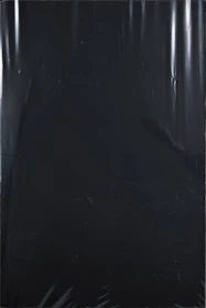 Close-up of a smooth, uninterrupted black surface with no texture.