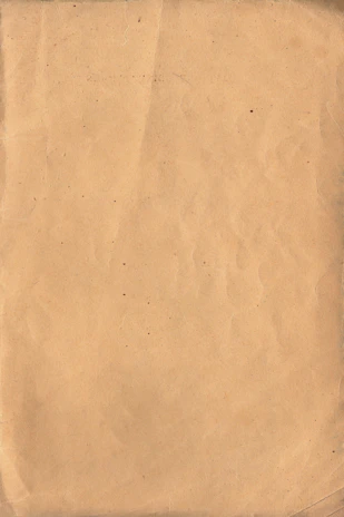 Close-up of textured vintage paper with subtle grain and film noise effect