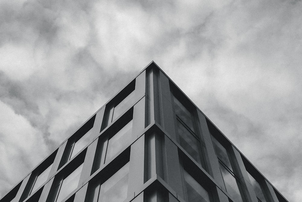 a black and white photo of a tall building