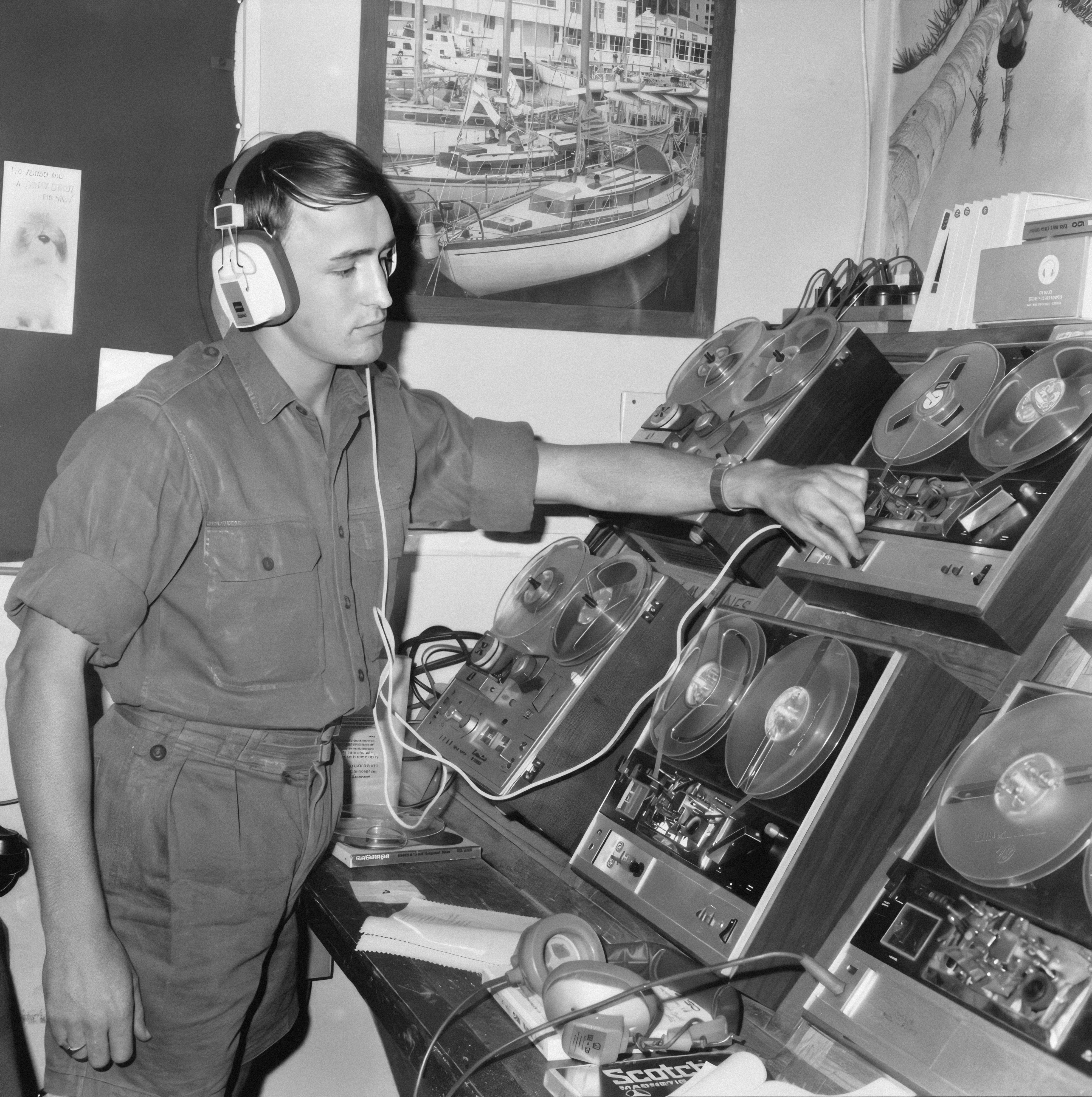 Tunes for the troops ID number: FAI/70/0197/VN/ Photographer: John Geoffrey Fairley Place: Vung Tau, Vietnam Signalman (Sig) Ian Thompson recording music on reel to reel tape for soldiers of the 1st Australian Logistic Support Group. https://www.flickr.com/photos/australian-war-memorial/22294485149/in/album-72157658018636163/