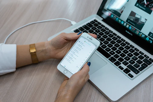 Close-up of hands conducting an audit checklist on a tablet for ISO compliance.