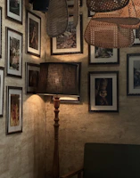 A cozy corner with a vintage lamp casting a warm glow over a stack of Compassion Keys notes.