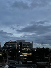 Luxembourg city skyline at dusk with modern office buildings.