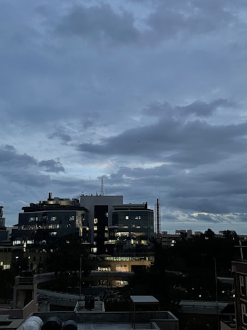 Luxembourg city skyline at dusk with modern office buildings.