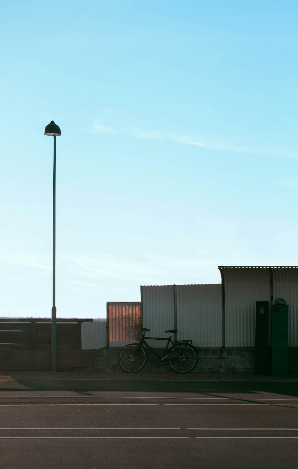 a bike is parked on the side of the road