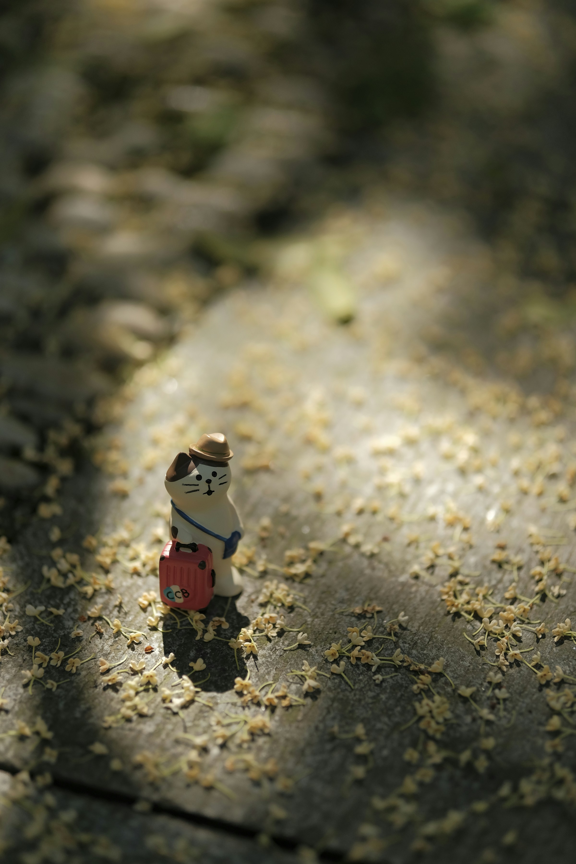 a small toy is sitting on the ground
