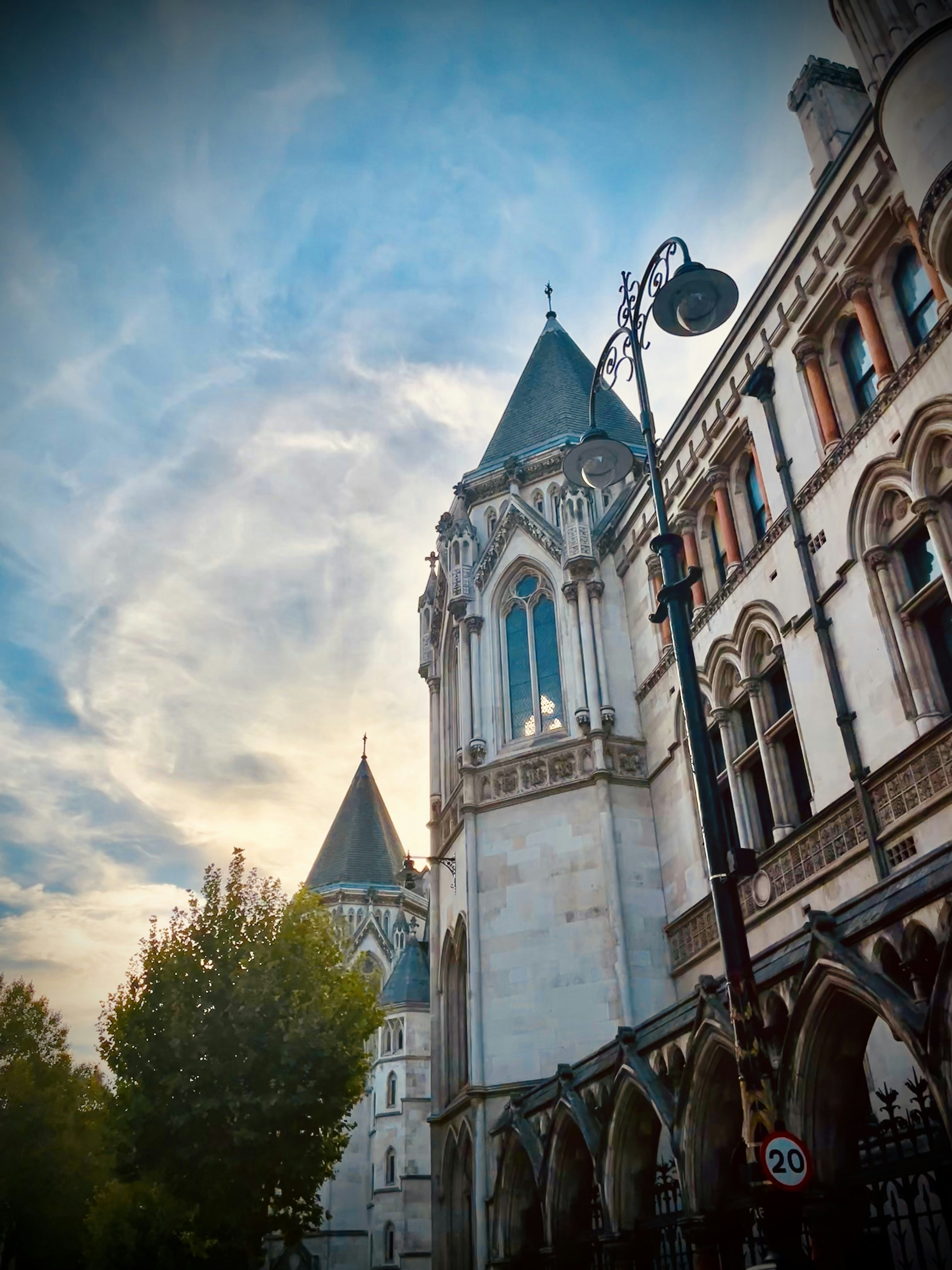 a tall building with a clock on it's side