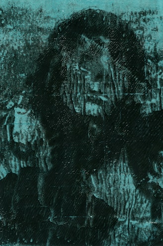 A textured image with a dark, abstract figure set against a distressed, grungy background. The figure appears to be obscured by a pattern that resembles dripping paint or heavy brushstrokes.