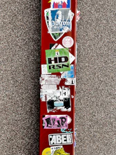 Close-up of vibrant custom stickers applied on various surfaces.