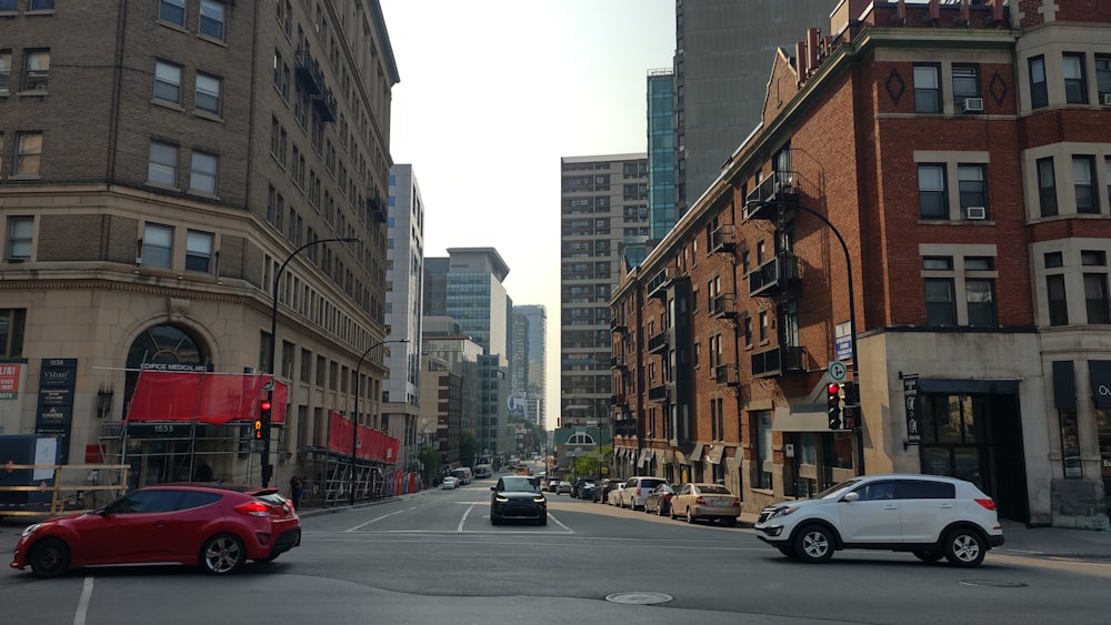 a city street filled with lots of tall buildings