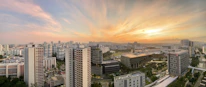 A panoramic view of Lomé city skyline highlighting residential and commercial buildings.