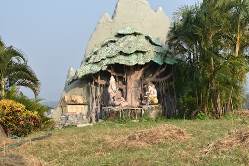 An intricate 3D character model in a natural setting.