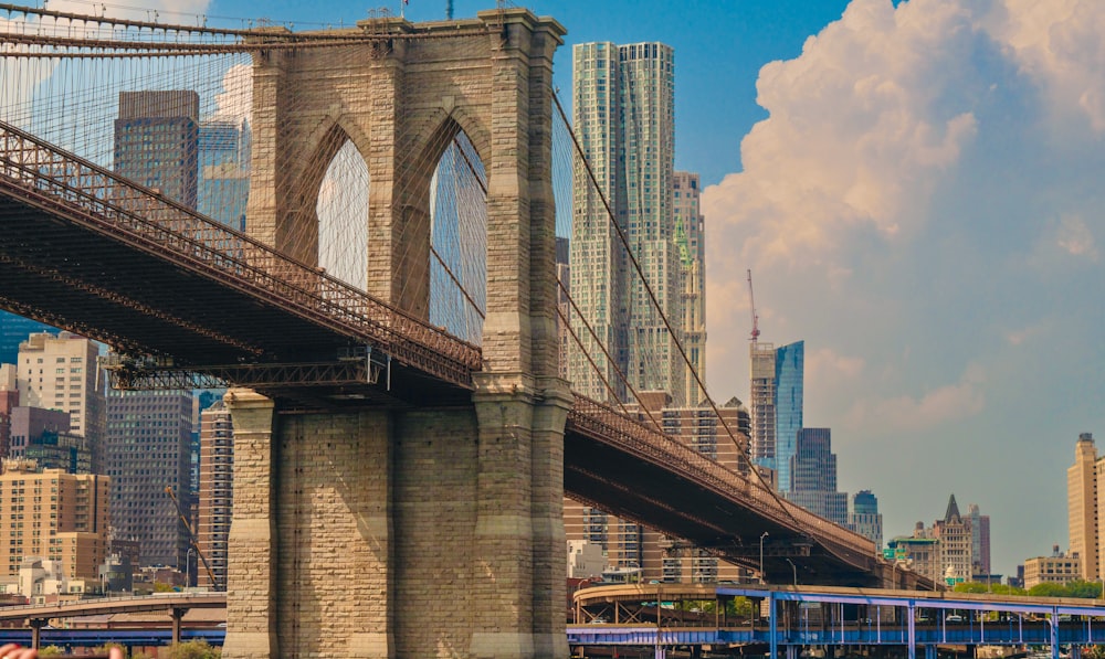 a view of the brooklyn bridge from the water