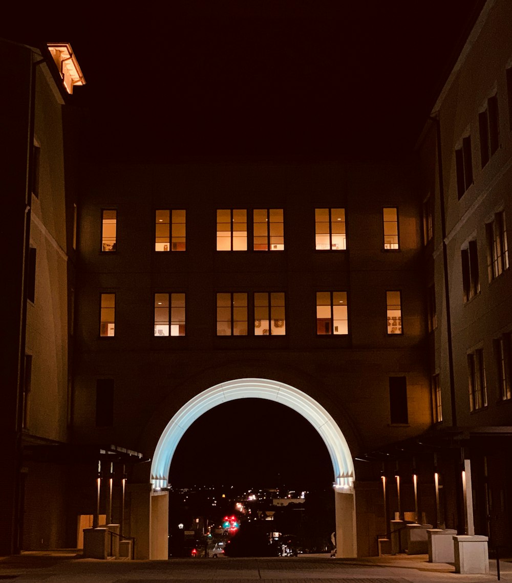 a building with a large archway in the middle of it