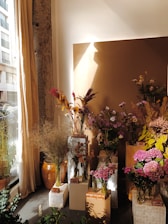 A beautifully arranged display of exclusive premium vases in an elegant room setting.