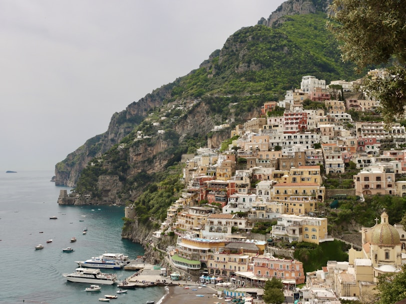 a view of a village on the side of a mountain