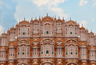 a very tall building with many windows and arches