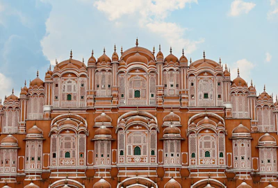 a very tall building with many windows and arches