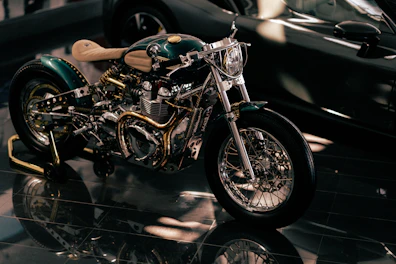 Custom 3D printed motorcycle parts displayed on a workbench with tools.