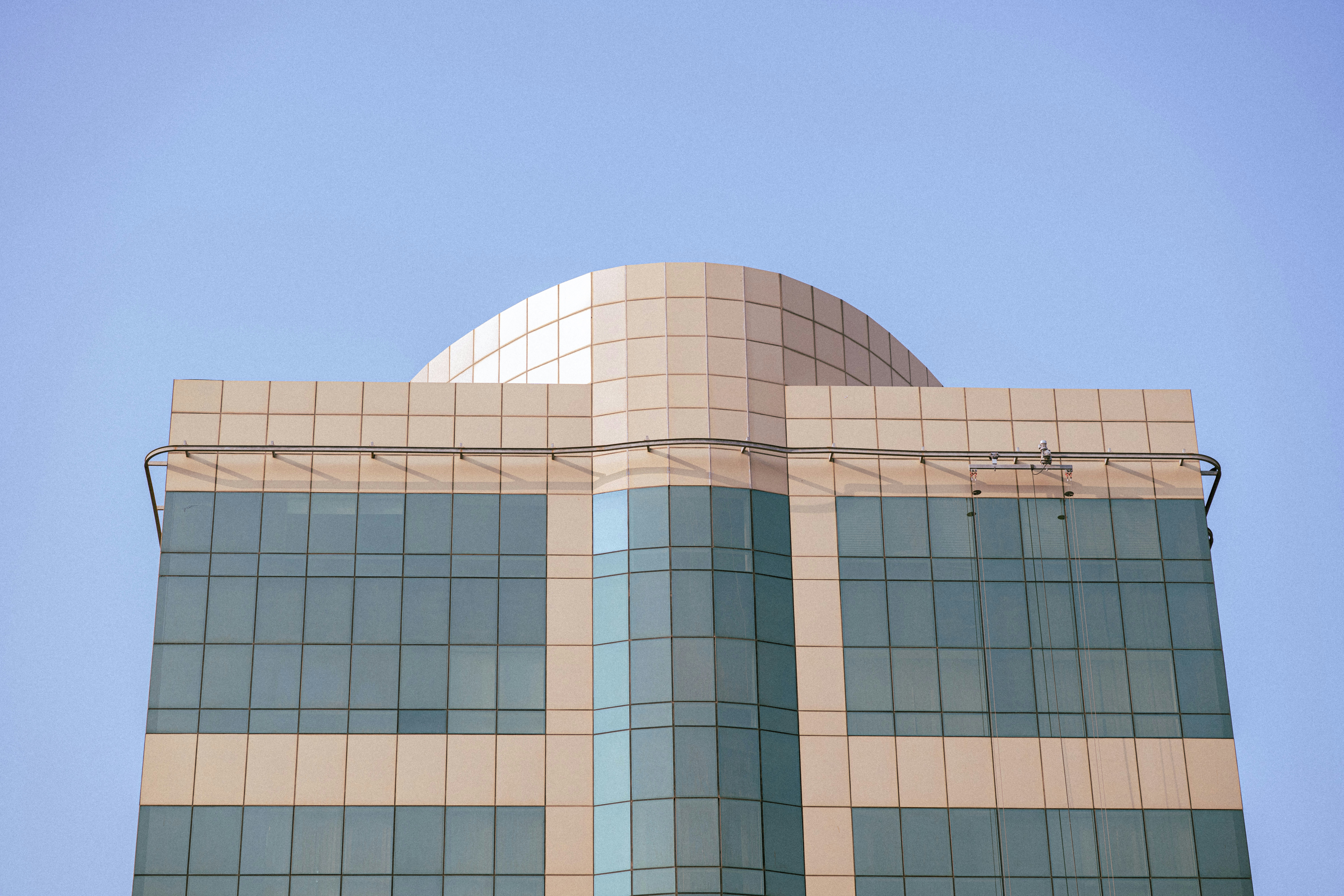 a tall building with a clock on the top of it