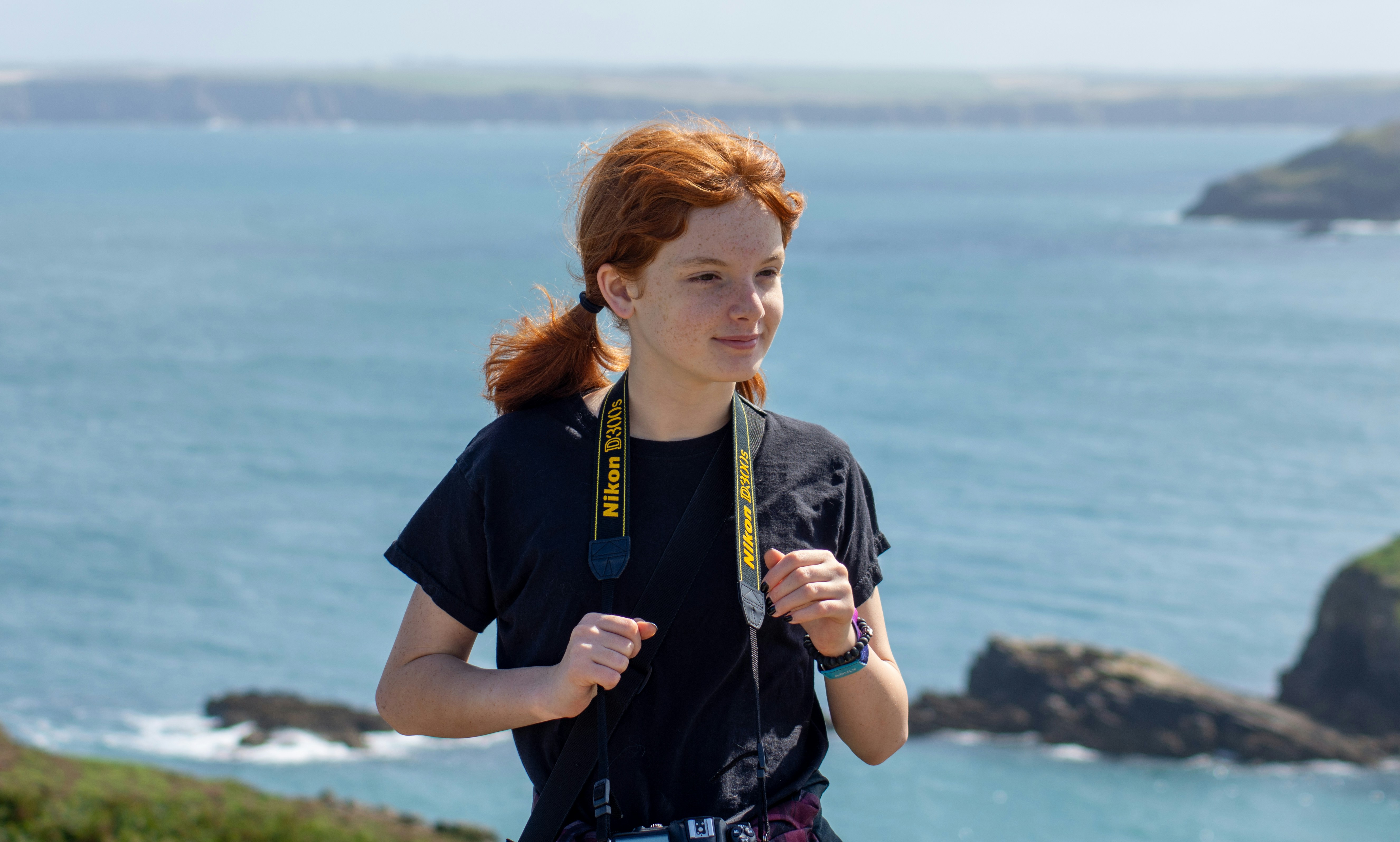 a woman with a measuring tape around her neck