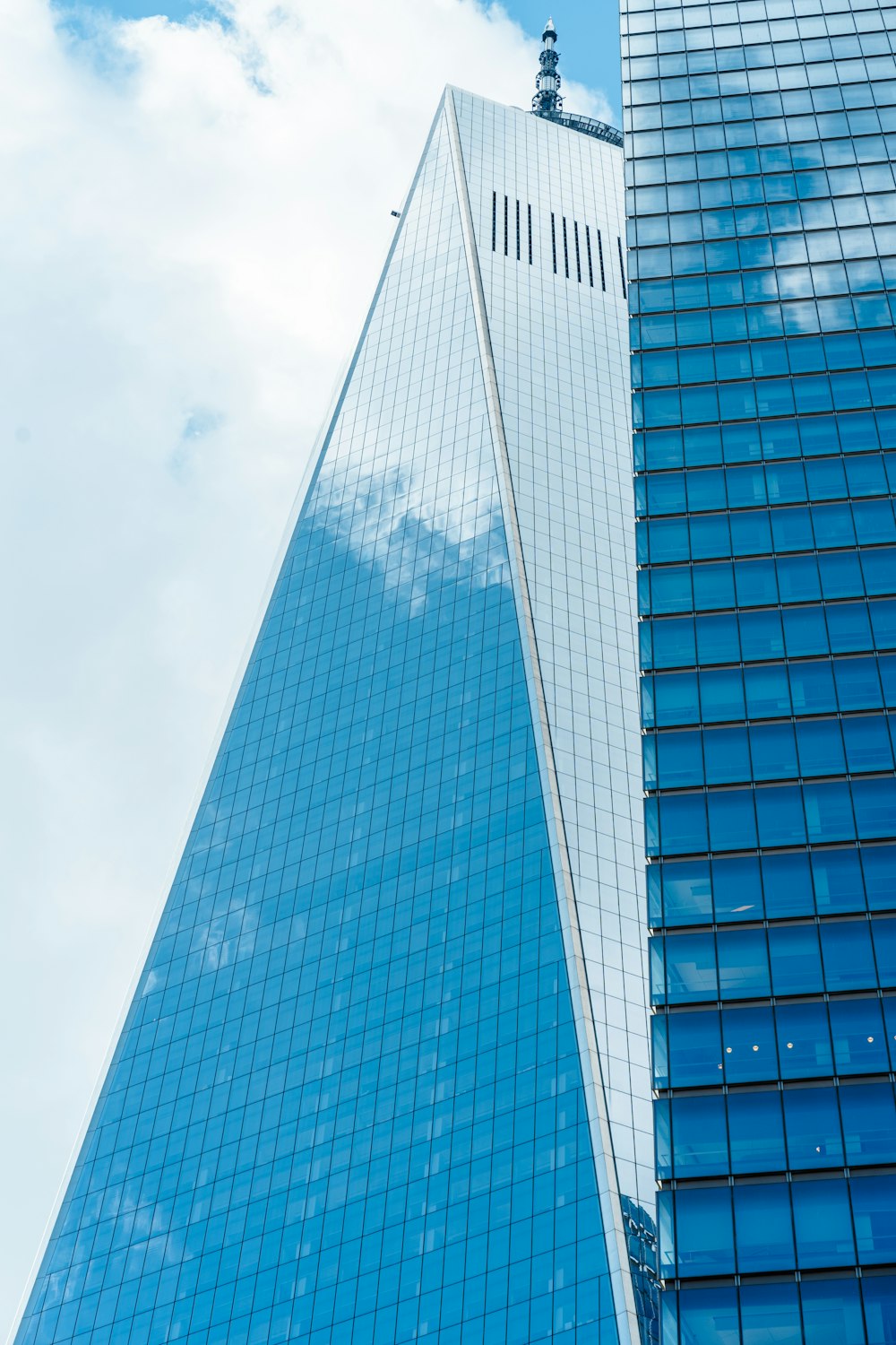 a very tall building with a sky background