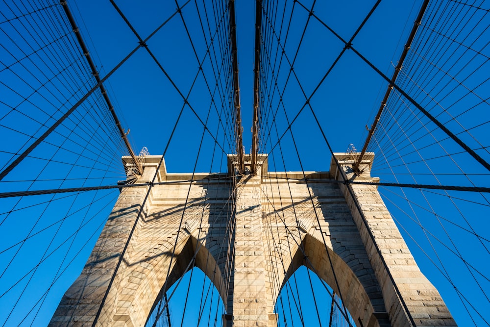 a very tall bridge with lots of wires on it