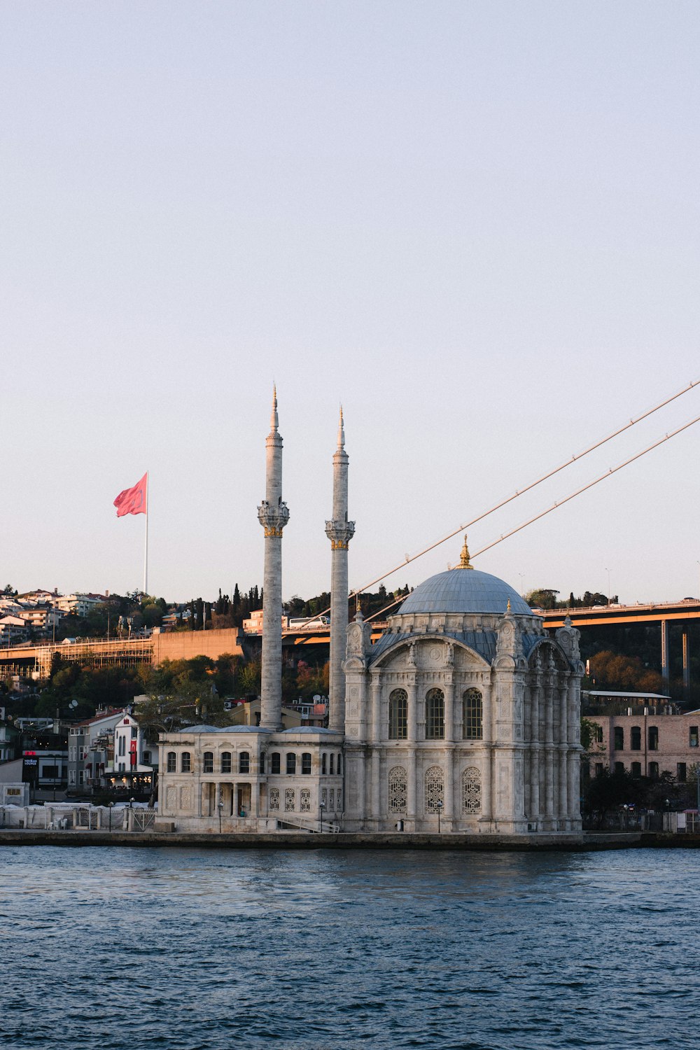 a large building sitting on top of a body of water