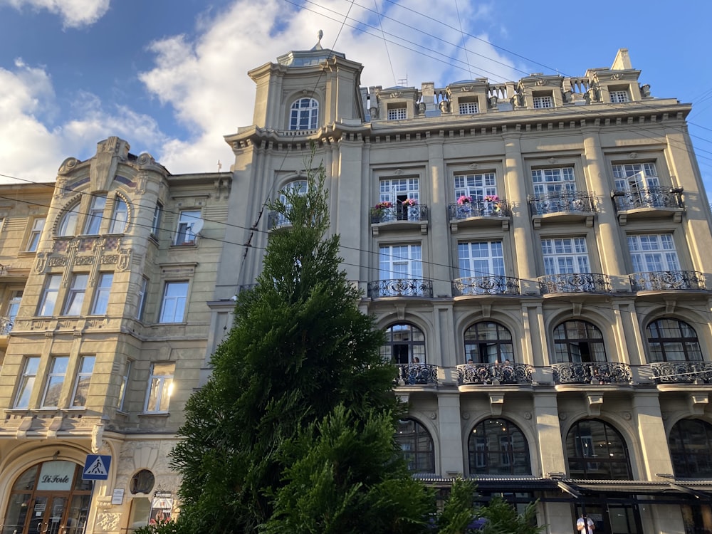 a large building with many windows and balconies