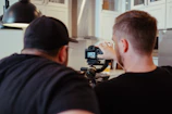 A behind-the-scenes shot of a content creator collaborating with a brand team.
