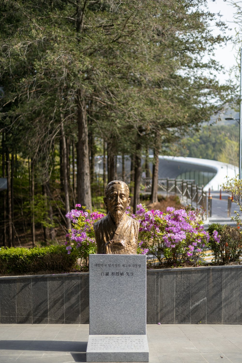 a statue of a man in a park