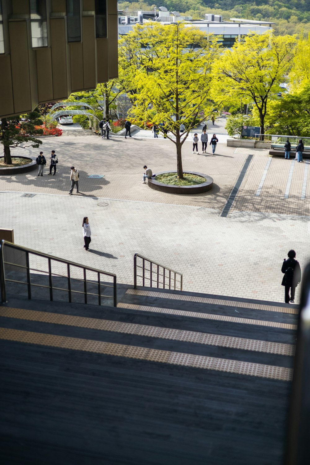 a group of people walking up and down stairs