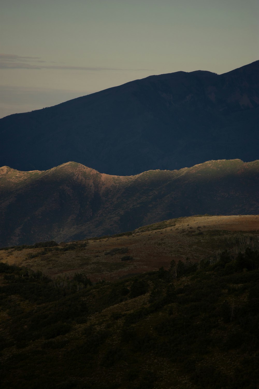 a view of a mountain range from a distance