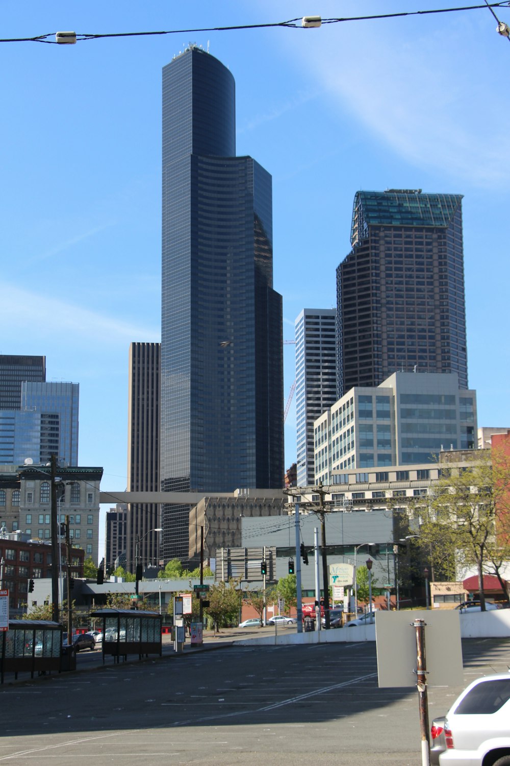 a view of a city with tall buildings in the background