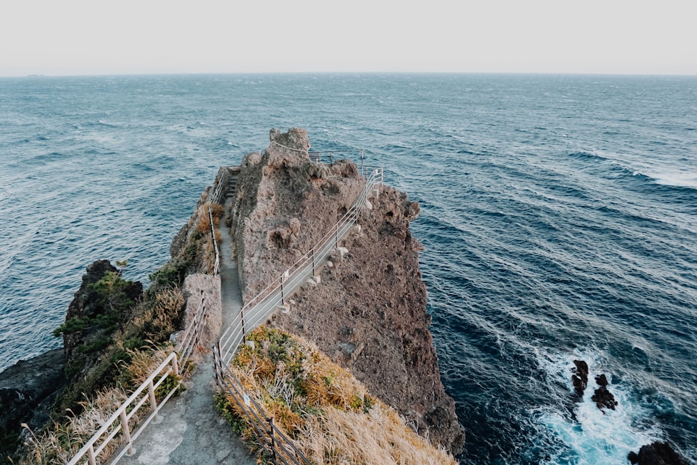 a view of the ocean from the top of a cliff