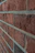 Close-up of a beautifully finished brick wall highlighting expert craftsmanship.