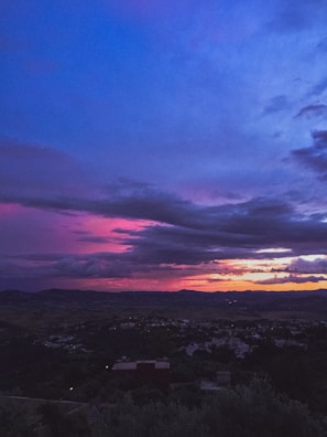 Sunset over the hills surrounding Arcoverde with soft blue and orange hues